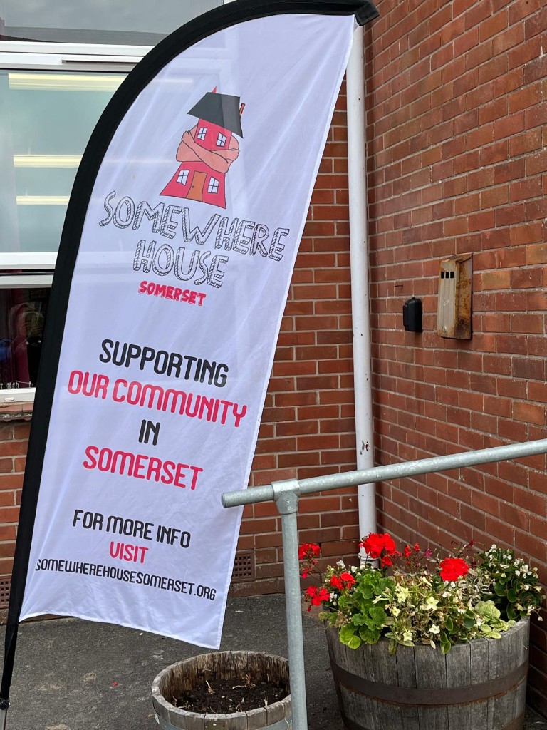 Custom printed feather flag for Somewhere House Somerset