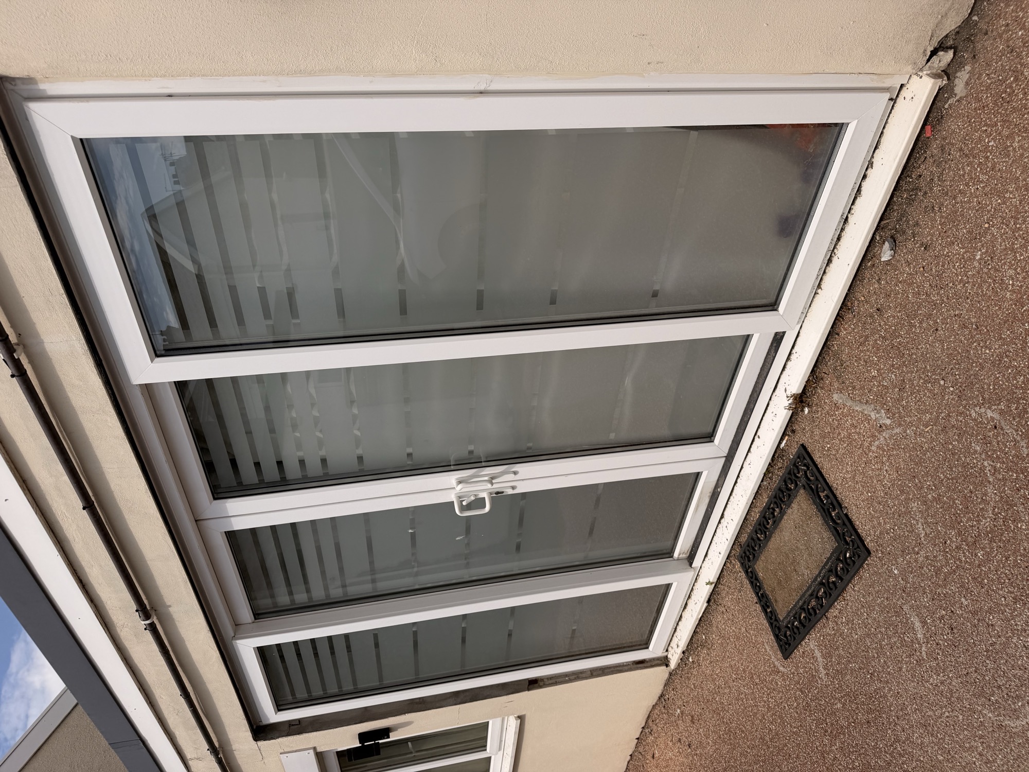 Frosted window manifestation with privacy film and striped bands on sliding glass doors